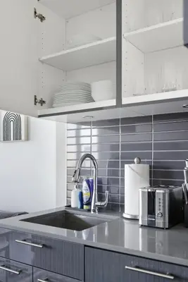 a kitchen with a sink and a counter top at Bright 2BR Downtown Toronto Condo in Toronto