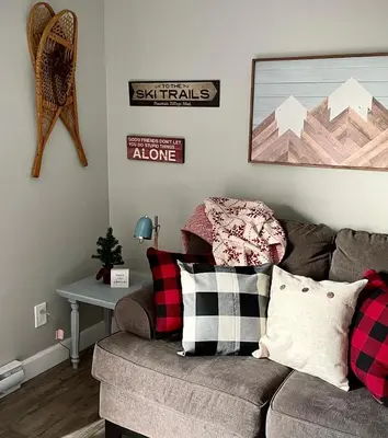 a living room with a couch and a table at The Klinck House in Collingwood