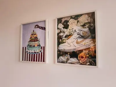 two pictures of a cake on a wall at LuxCondo in the Downtown Kitchener Uptown Waterloo in Kitchener