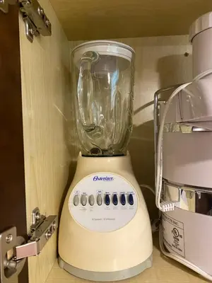 a blender sitting on top of a kitchen counter at Stylish 2Bedroom Basement Suite in Oakwood Village in Toronto