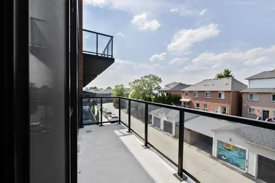 a view from the balcony of a house at Stylish 3BR Penthouse with Stunning City Views in Toronto
