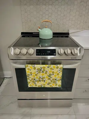 a stove with a pot on top of it at Your cozy Caribbean-inspired stay just 1 hour north of Toronto in Alliston