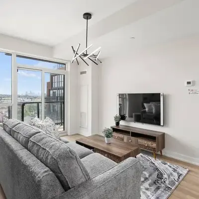 Elegant 4BR Condo with City Views & Free Parking