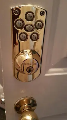 a gold door handle with a door nob on it at Cozy Suite in Milton ON Keyless Entry No Pets in Milton