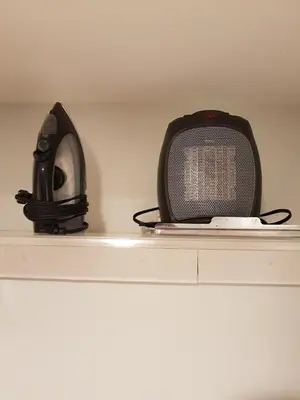 a tv sitting on top of a shelf at Cozy Suite in Milton ON Keyless Entry No Pets in Milton