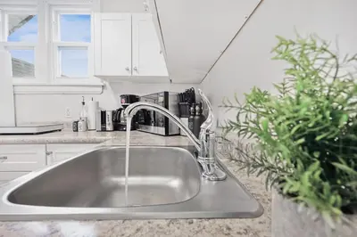 a kitchen sink with a faucet in a kitchen at 2 BR 1 Bath Apt with Parking and Close to all Amenities in Oshawa