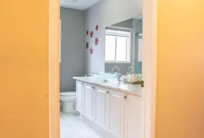 a bathroom with a sink and a toilet at Royal Luxury Central Home with Gazebo By Toronto in Brampton