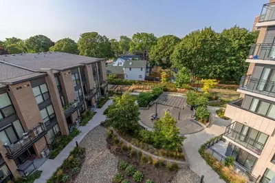 an aerial view of a courtyard in a apartment building at Scarborough Oasis near UofT campus, Free Parking in Toronto