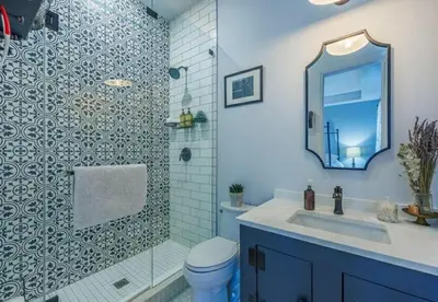 a bathroom with a toilet and a sink and a mirror at Luxury Countryside Villa in Waterford