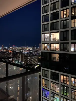 a view of a city at night from a building at Luxury All-Inclusive One-Bedroom Condo in Downtown in Toronto
