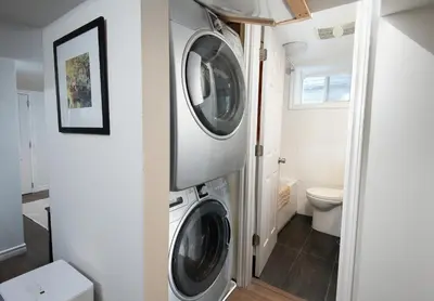 a laundry room with a washer and dryer at East Toronto BNB in Toronto