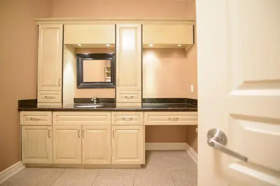 a bathroom with a sink and a mirror at STONEHAVEN RETREAT in Niagara Falls