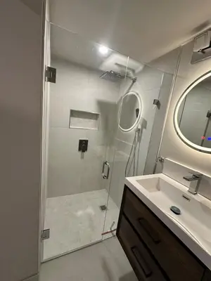 a bathroom with a shower and a sink at 1-Bedroom 1Bathroom Entire Unit closer to Fairview Mall & Waterloo Airport in Kitchener
