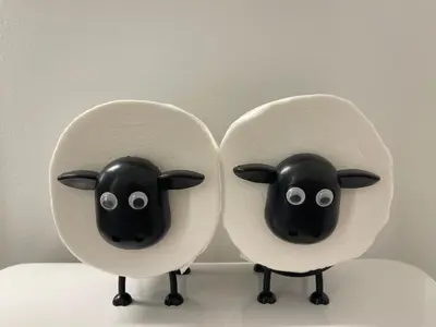 two rolls of toilet paper with sheep heads on them at Academic Oasis in London