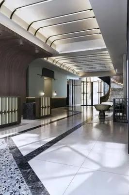 a lobby of a hotel with a large lobby at Le Méridien Toronto Pinnacle Hotel in Toronto