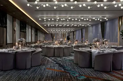 a row of tables in a banquet hall at Le Méridien Toronto Pinnacle Hotel in Toronto
