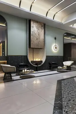 a lobby with chairs and a tv on the wall at Le Méridien Toronto Pinnacle Hotel in Toronto