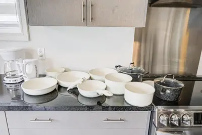 a group of bowls on a counter in a kitchen at Modern Spacious Luxury detached-House new in RH in Richmond Hill