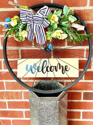 a clock on a brick wall with a welcome sign at Top 1% Quiet Private Guestroom 2ppl Old Town NOTL in Niagara on the Lake