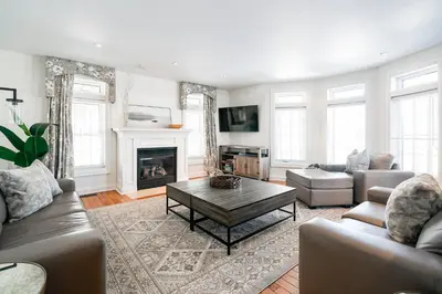 a living room with a couch and a coffee table at Peaceful 3Bdrm Spacious NOTL Home mins to Town in Niagara on the Lake