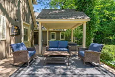 a gazebo with chairs and a table on a patio at Hot Tub | Historic Home | Steps to Everything NOTL in Niagara on the Lake