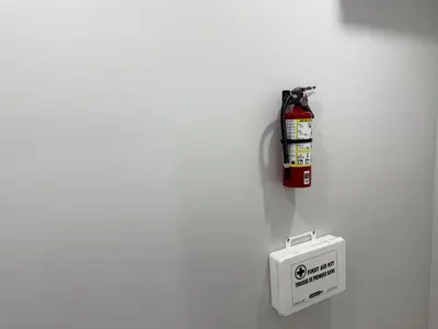 a fire extinguisher and a box on a wall at Cozy Private Two-Level Suite In Brampton With Separate Entrance And Living Area on Main Floor in Brampton