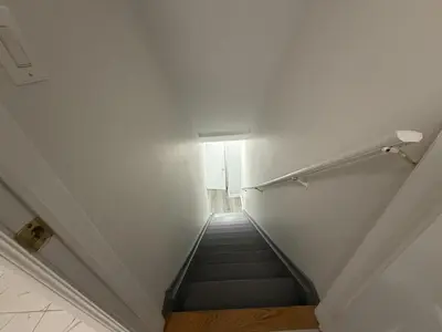 a stairway with a stair railing and a stair case at Cozy Private Two-Level Suite In Brampton With Separate Entrance And Living Area on Main Floor in Brampton