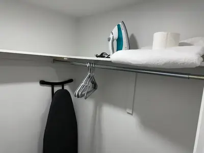 a shelf in a bathroom with a towel at Cozy Private Two-Level Suite In Brampton With Separate Entrance And Living Area on Main Floor in Brampton