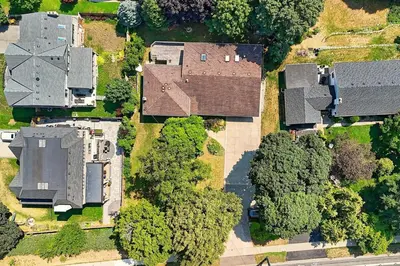 an overhead view of a yard with houses and trees at SPACIOUS & FULLY PVT-2BR UNIT ON GROUND LEVEl in Burlington
