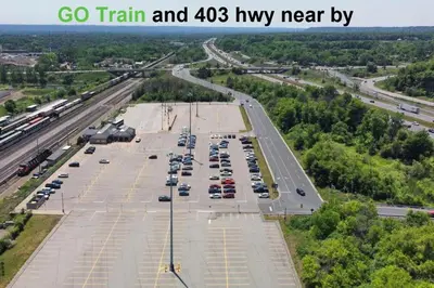 an aerial view of a parking lot with cars at SPACIOUS & FULLY PVT-2BR UNIT ON GROUND LEVEl in Burlington