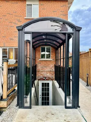 an expandable pavilion in front of a brick building at Modern Cozy Basement Suite Free Parking in Brampton