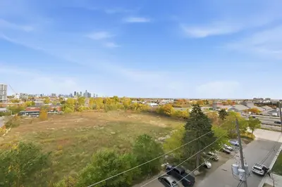 an aerial view of a parking lot with a field at Modern 3BR Condo Sleeps 8 with Floor-to-Ceiling Views in Toronto