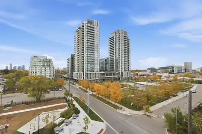 an aerial view of a city with tall buildings at Cozy 2BR Condo with Free Parking & City Views in Toronto