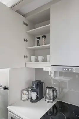 a kitchen with a coffee maker on a counter at Chic Downtown TO Studio Near Entertainment Dist in Toronto