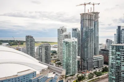 an aerial view of a city with tall buildings at Bright High Floor1 Bedroom Condo Downtown Toronto in Toronto