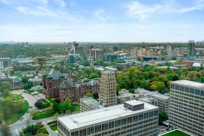 an aerial view of a city with tall buildings at 1 Bedroom Condo Burano Downtown Toronto in Toronto