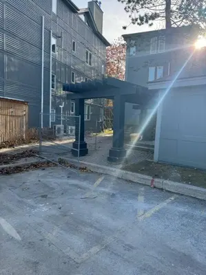 an empty parking lot next to a building at Easy Rider Chalet Steps to Lift & Blue Village in Blue Mountains