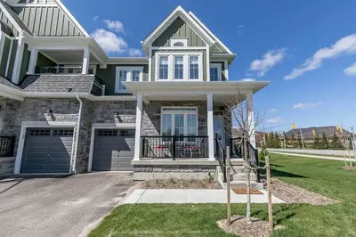 a large house with a driveway in front of it at Blue Mtn Village Retreat Walk to Blue - Shuttle in Collingwood