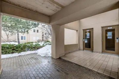 an empty lobby of a building with snow on the ground at Mountain Walk Retreat - Walk to Blue Patio area in Blue Mountains