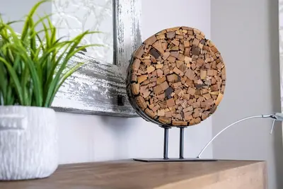 a wooden sphere on a table next to a plant at Foxwood Retreat - Shuttle to Blue Pool & Hot Tub in Blue Mountains