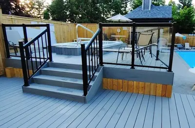 a deck with stairs next to a swimming pool at Mountainside Escape Ski-In-Out Pool Shuttle in Blue Mountains