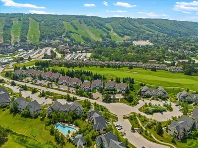 an aerial view of a resort with a golf course at Sierra Peaks - Village and Golf retreat in Blue Mountains