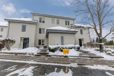 a house with snow in front of it at Sierra Heights - Steps to Blue Mountain Village in Blue Mountains