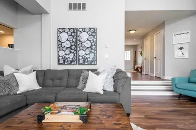 a living room with a couch and a coffee table at Memory Lane - Walk to the Village - Sleeps 10 in Blue Mountains