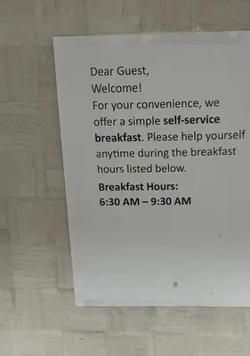 a sign on the side of a wall at V-Swim Suite-2 in Toronto