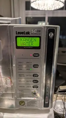 a microwave oven with a sign on the side of it at Bright ensuite with WiFi Parking available in Markham