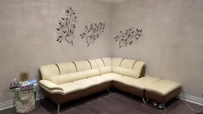a living room with a couch in a room at Bright Bedroom with Shared bathroom and WiFi Parking available in Markham