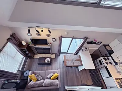 a living room with a couch and a table at Slopeside Loft at North Creek Resort in Blue Mountains