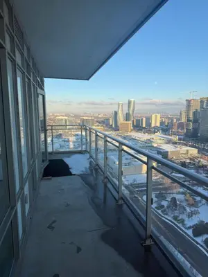 a balcony of a building with a view of the city at The greatest views in the heart of Mississauga in Mississauga