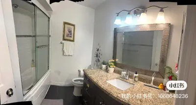 a bathroom with a sink and a shower and a toilet at 203 Comfortable private bedroom on second floor in Mississauga